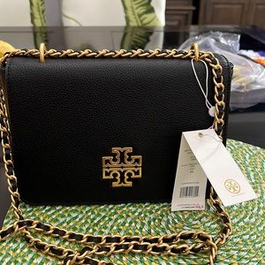 Is brand new Mk black Tory Burch purse